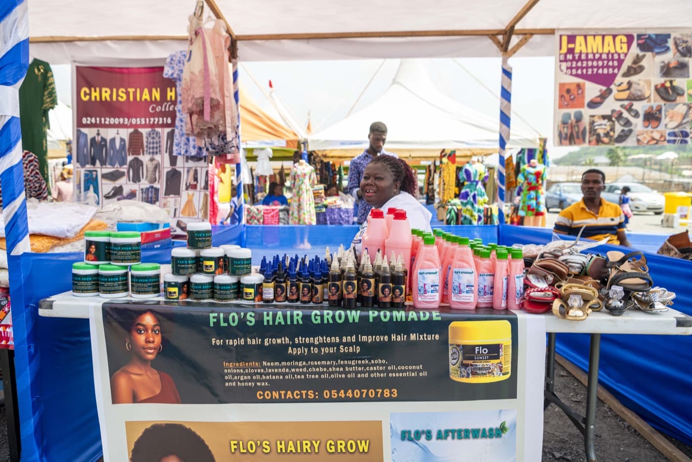 Hair and beauty products on display at a cosmetics stall