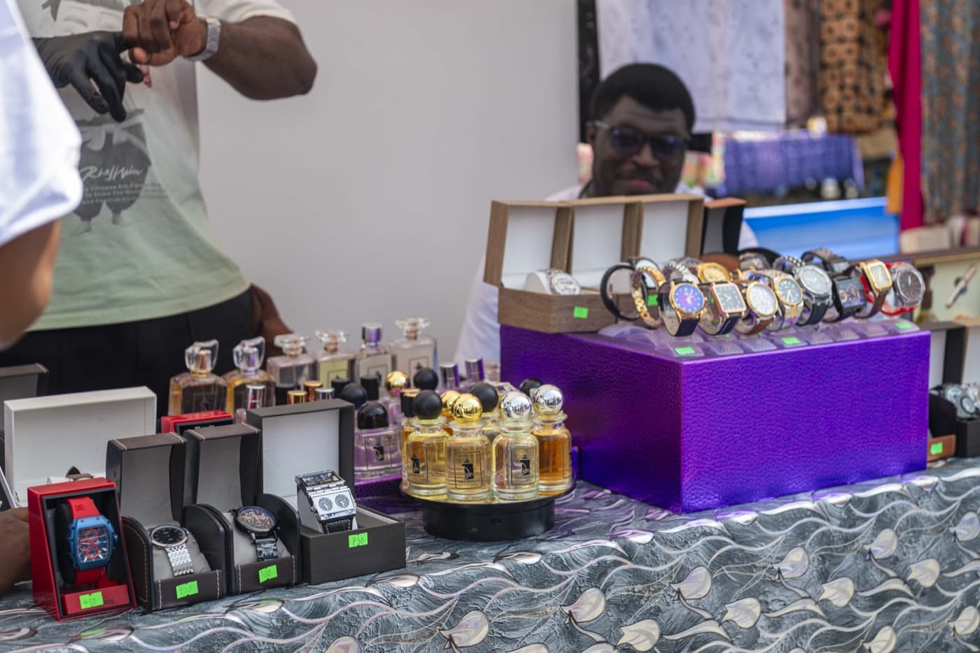 Watches and fragrances at an exhibitor's table