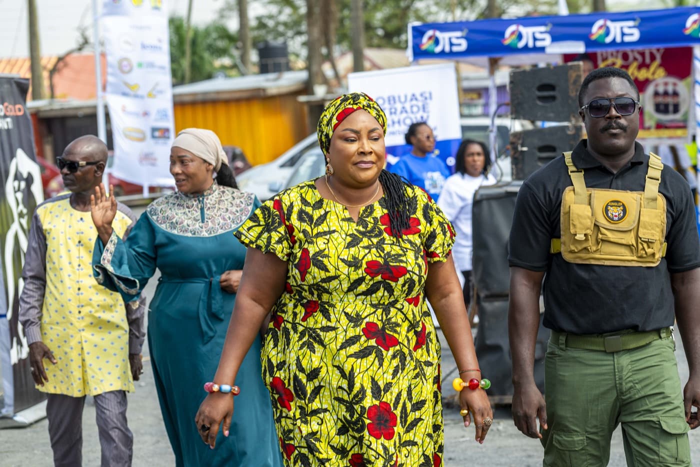 Dignitaries walking the trade show grounds